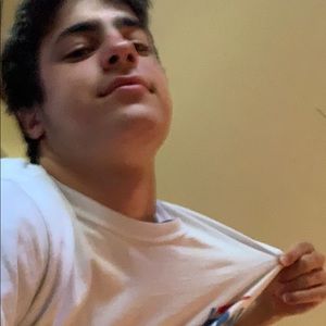 White tee with a couple letters on it or somethin